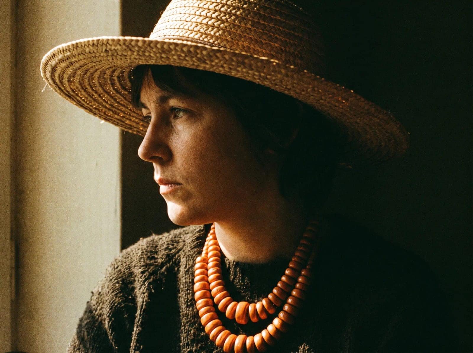 Grain Fashion Portrait, Heavy grain, hard shadow and a hat doing most of the talking