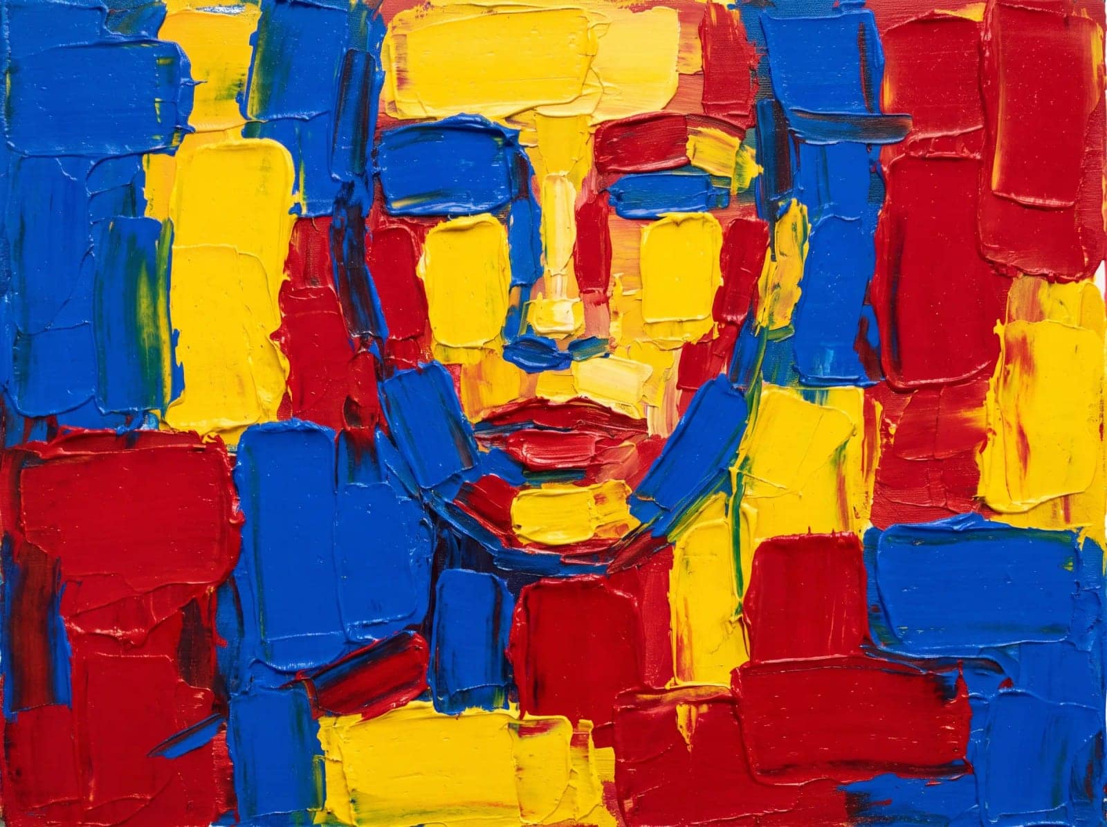 Knife Stroke Portrait, A face barely holding together under wide slabs of clashing colour
