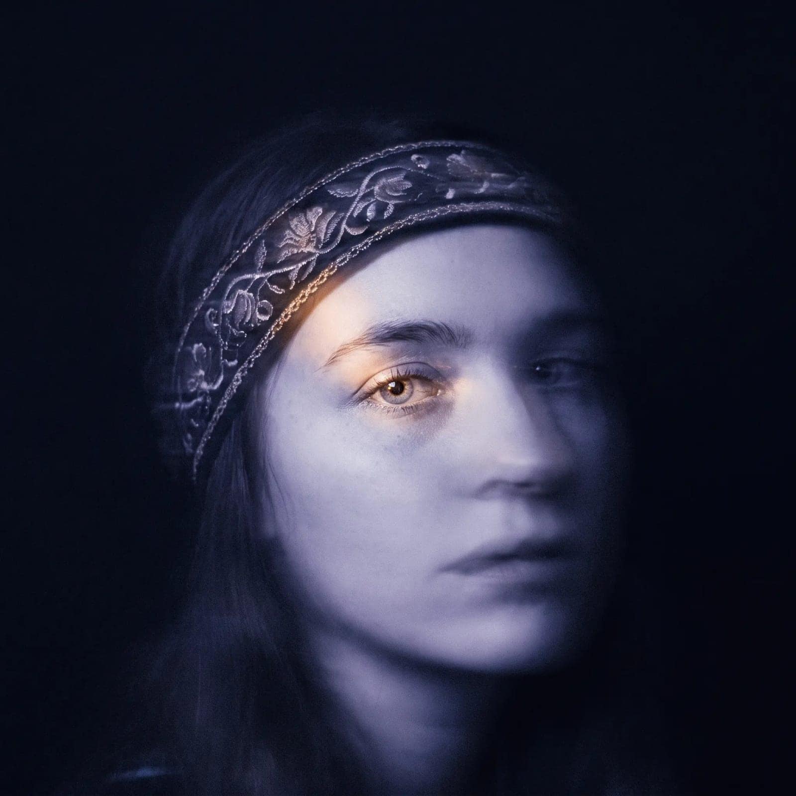 Motion Blur Portrait, A face caught mid movement, sharp in one place and gone everywhere else