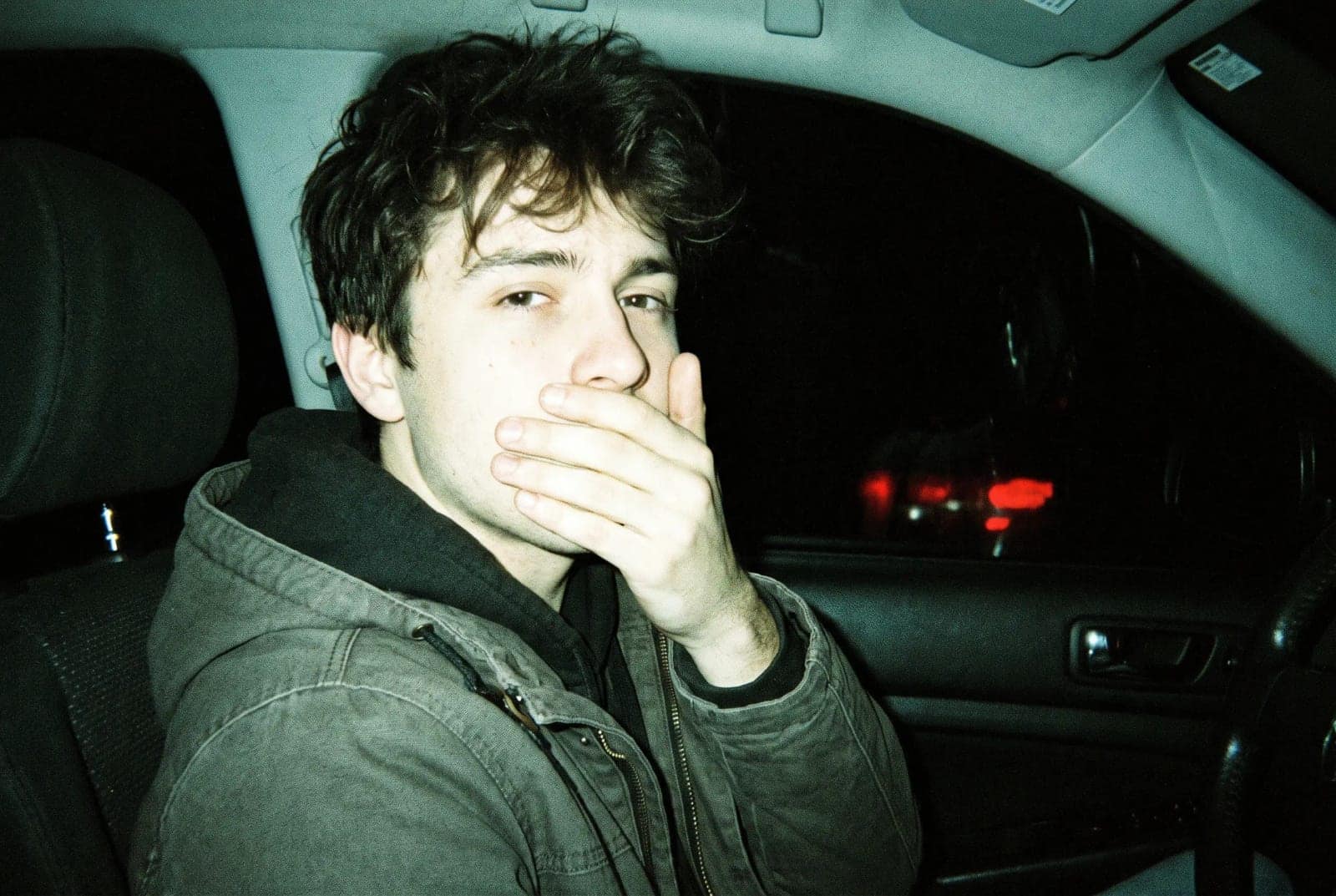 Night Flash Portrait, One hard flash in a dark car, everything beyond a metre swallowed by black